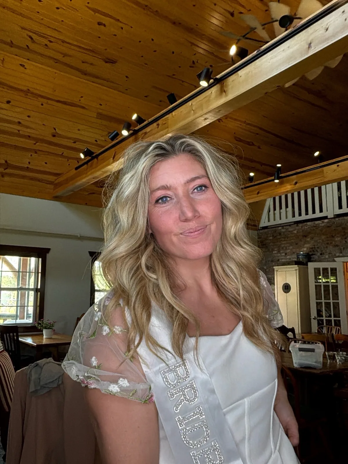 Bride posing for a digital photo booth portrait inside The Mockingbird